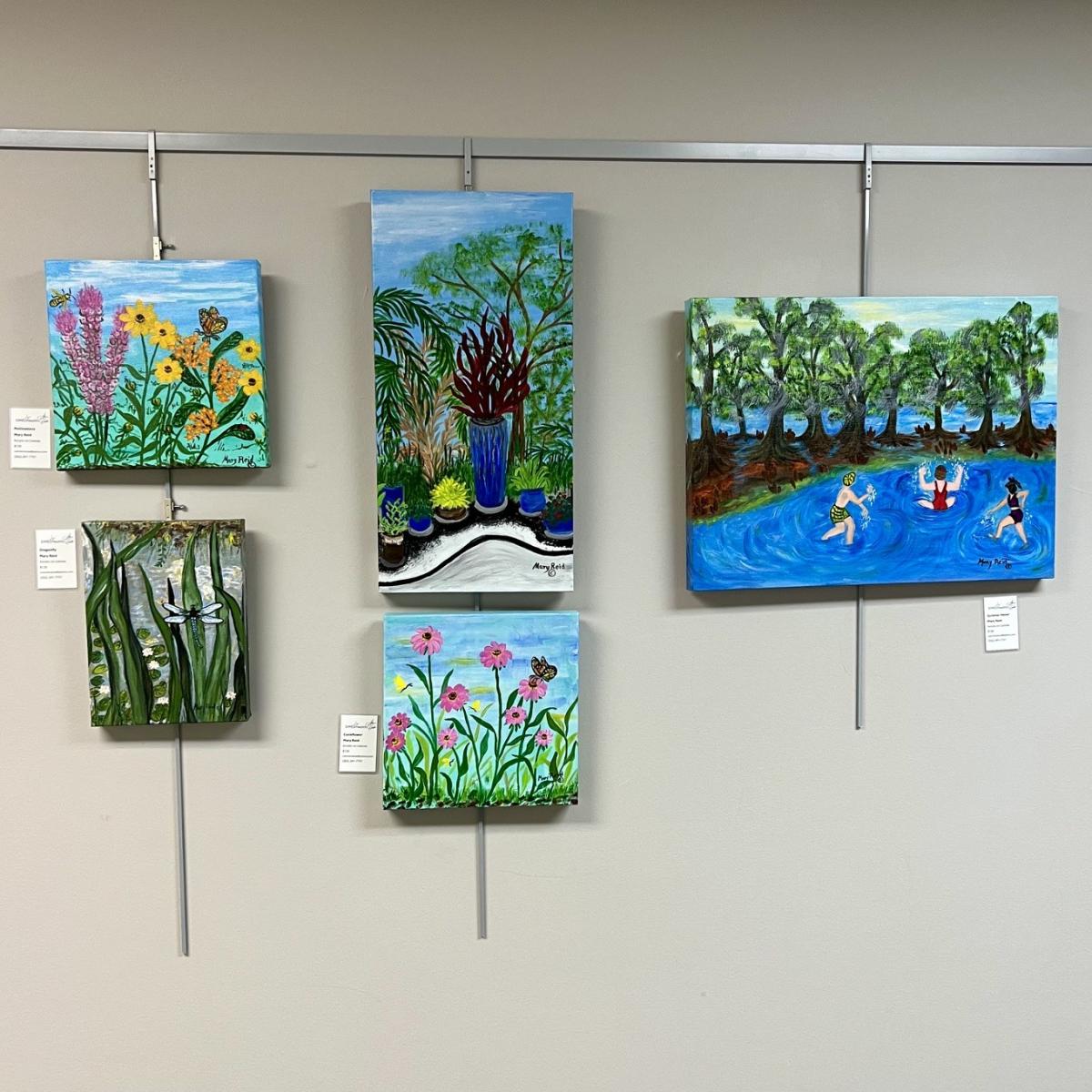 Four pieces of artwork featuring nature.