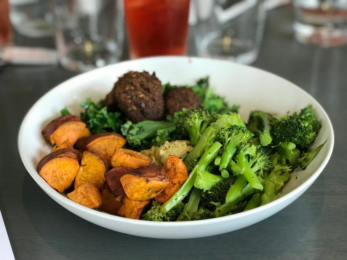 a healthy cooking meal consists of sweet baked potatoes instead of normal baked potatoes, veggies and a little bit of meat