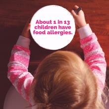A young girl stares at a bowl that includes a statistic about food allergies.